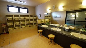 A restroom with multiple sinks, a mirror, and storage shelves. - Hotel Route - Inn Nishinasuno (Nasushiobara)