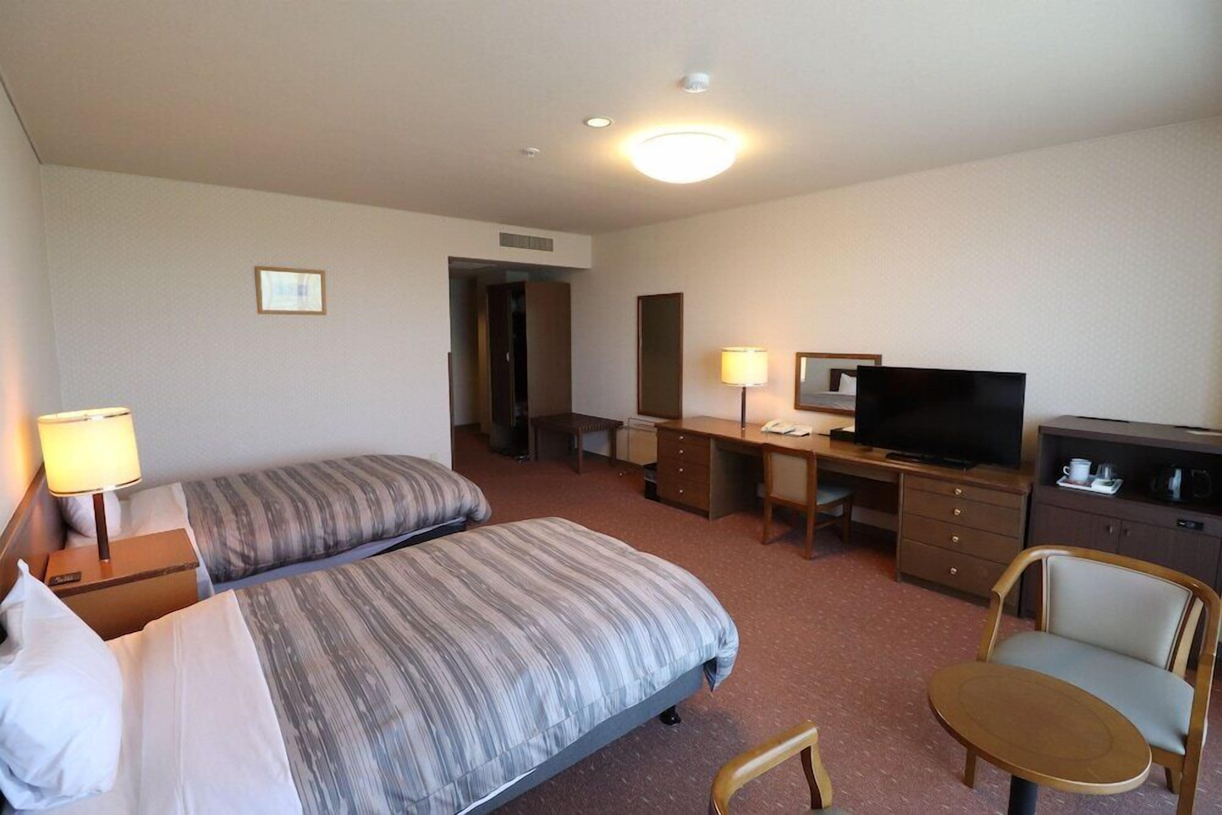 Desk, free WiFi, bed sheets