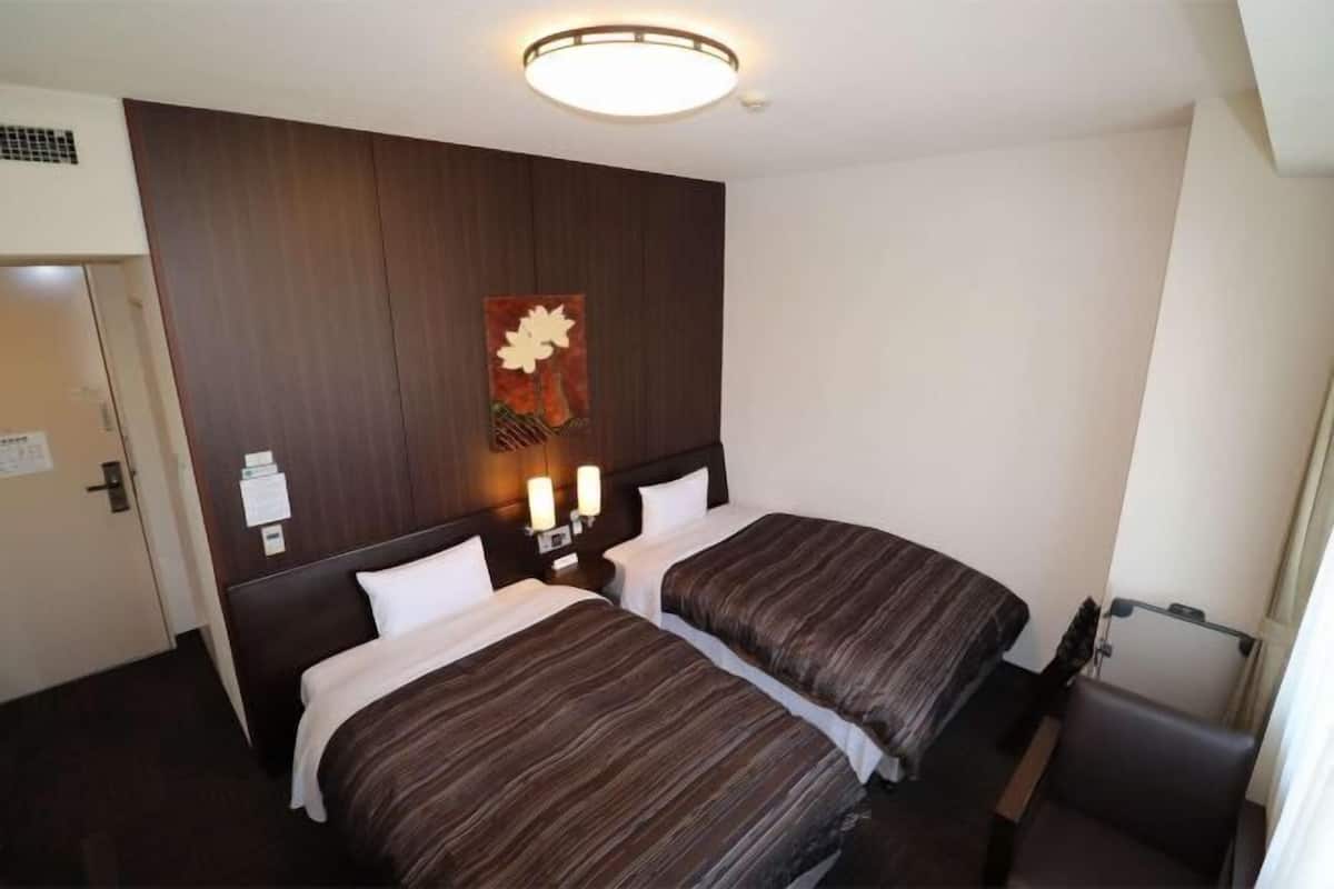 Desk, blackout curtains, free WiFi, bed sheets