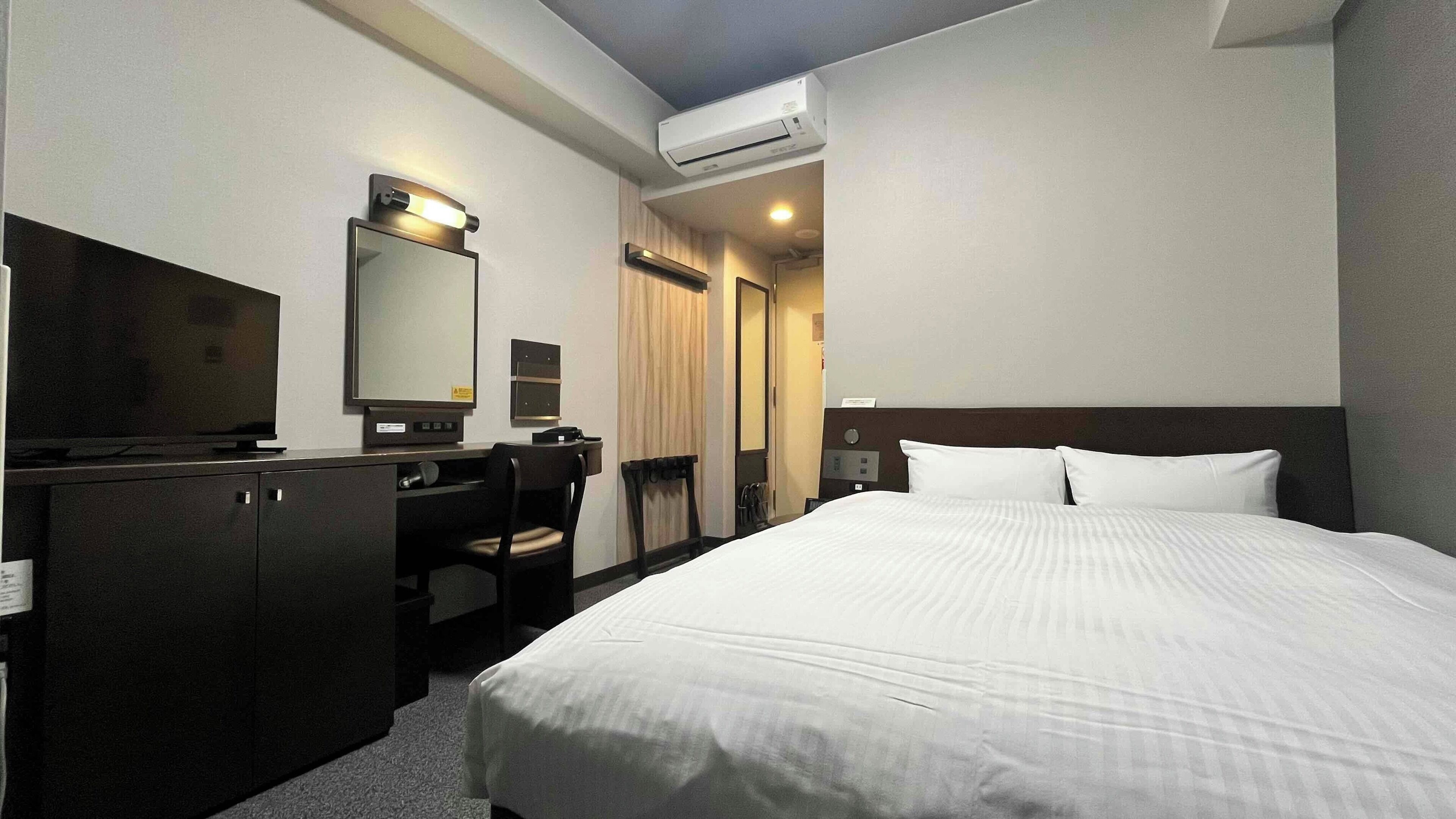 Desk, free WiFi, bed sheets
