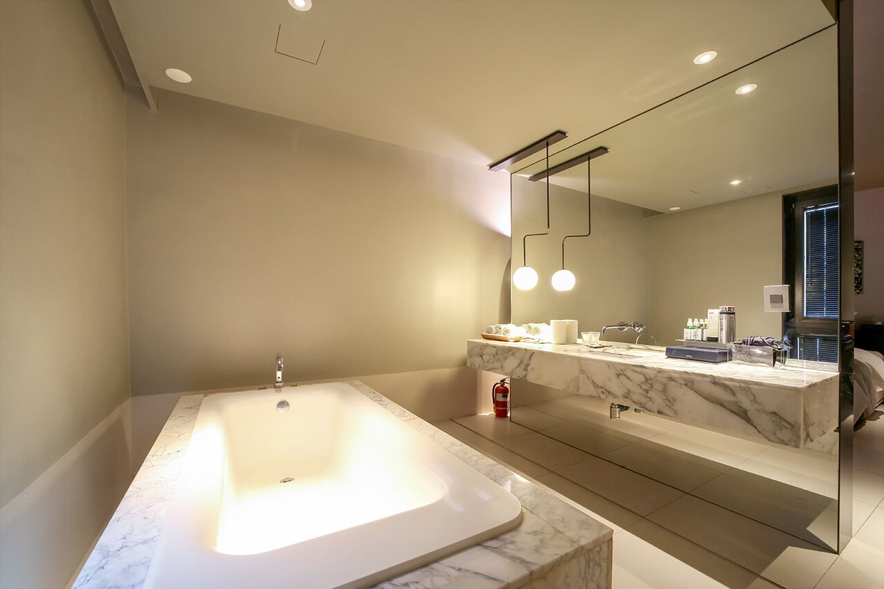 deluxe double room, non smoking | bathroom | hair dryer, bathrobes, slippers, bidet