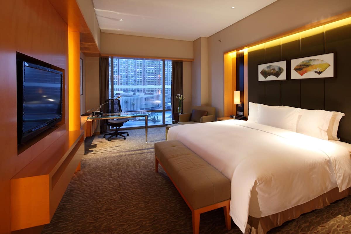 Premium bedding, down comforters, pillowtop beds, minibar