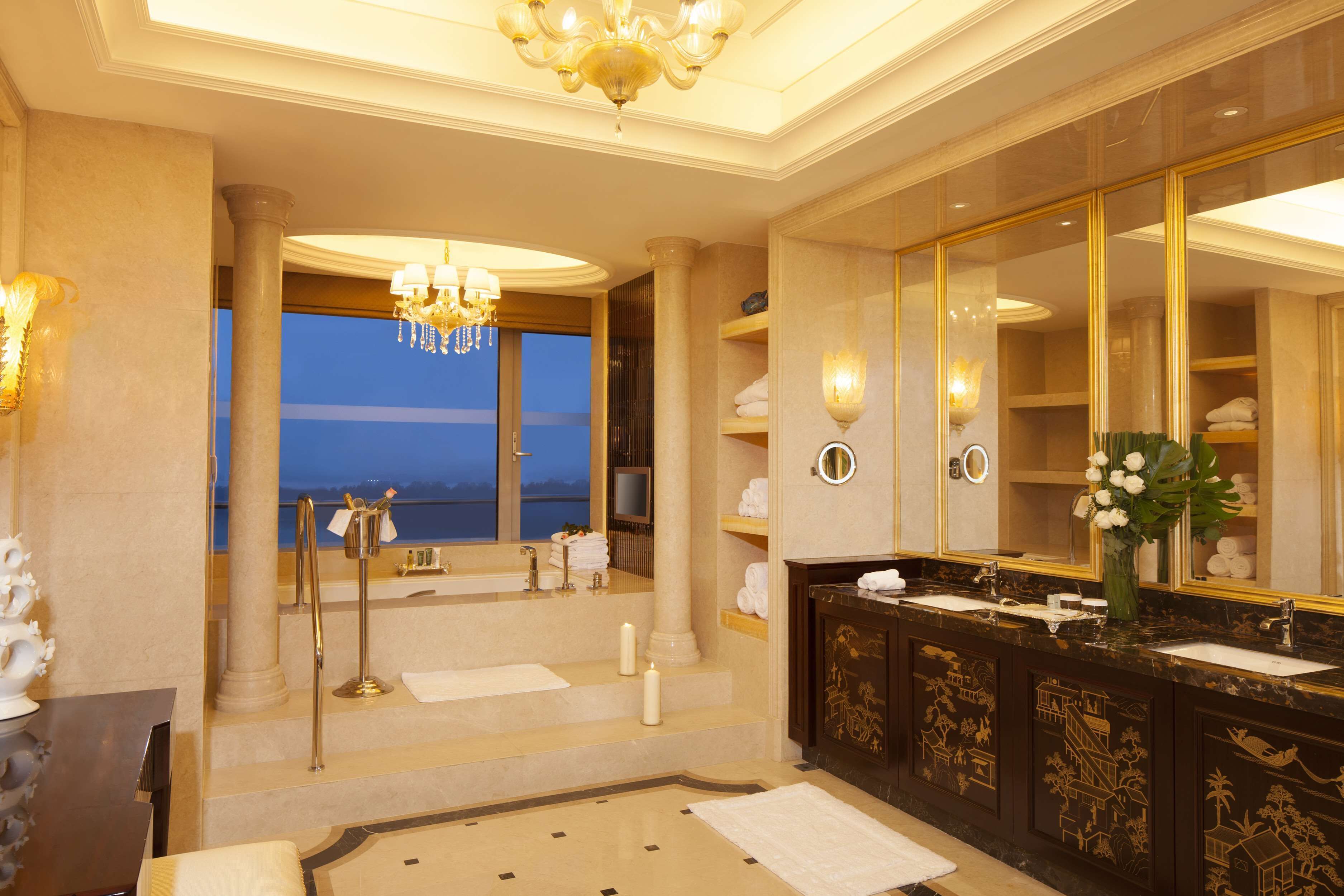 presidential suite | bathroom | combined shower/bathtub, rainfall showerhead, designer toiletries