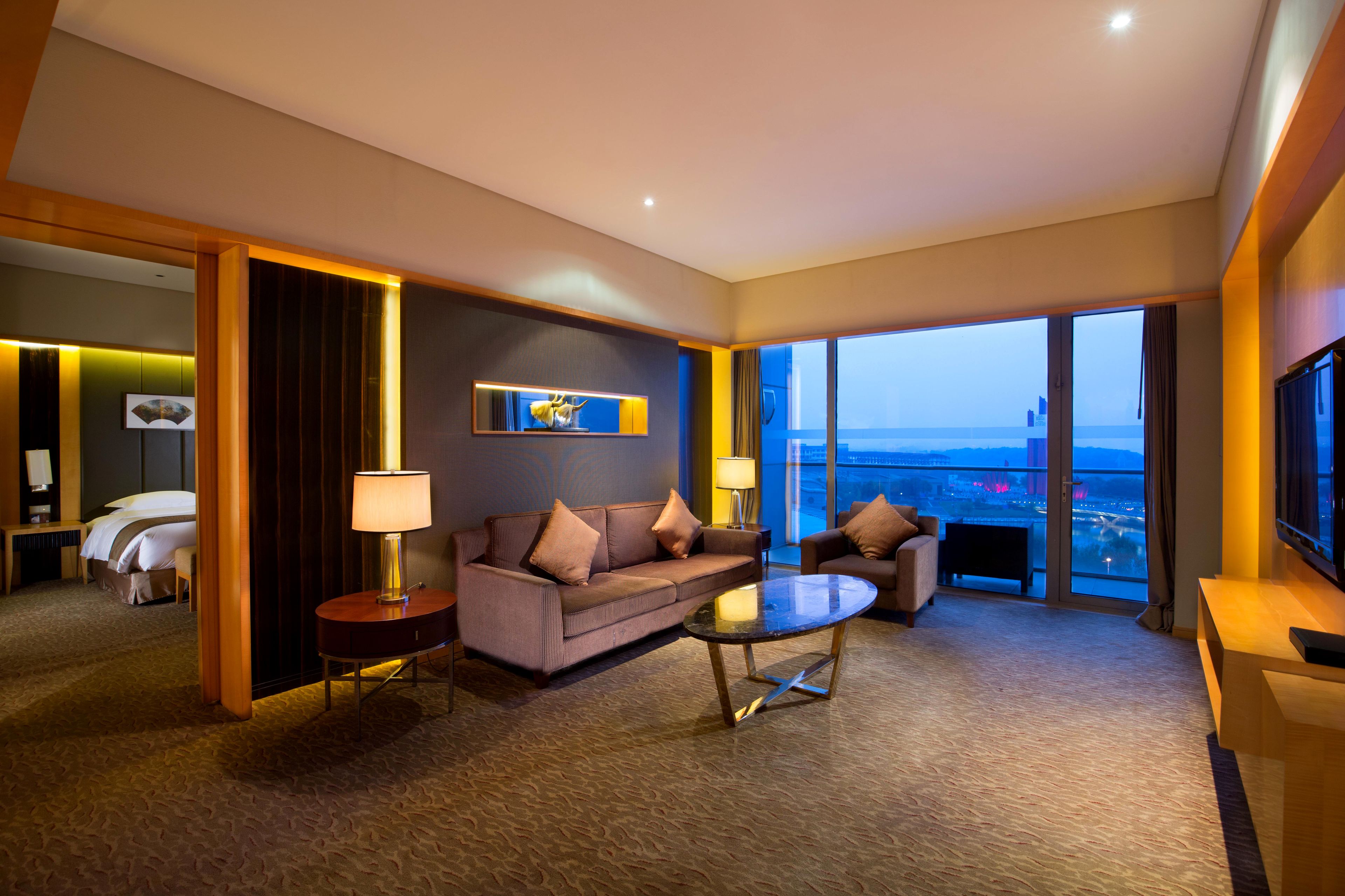 yangtze river suite | living area | 42-inch lcd tv with satellite channels, tv, dvd player