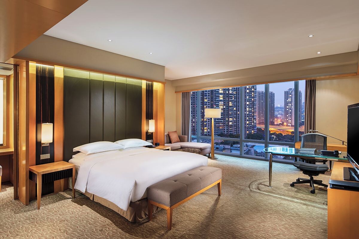 Premium bedding, down comforters, pillowtop beds, minibar