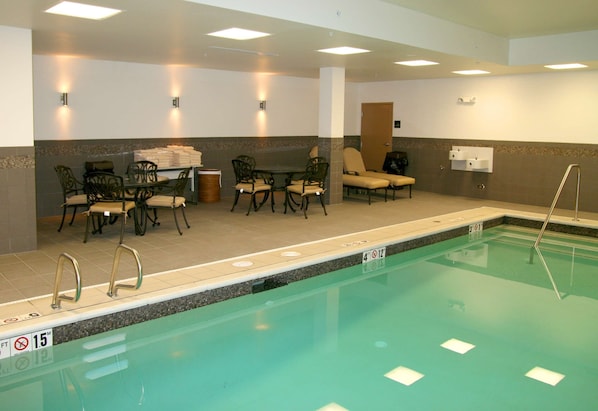 Indoor pool, open 6 AM to 10 PM, pool loungers