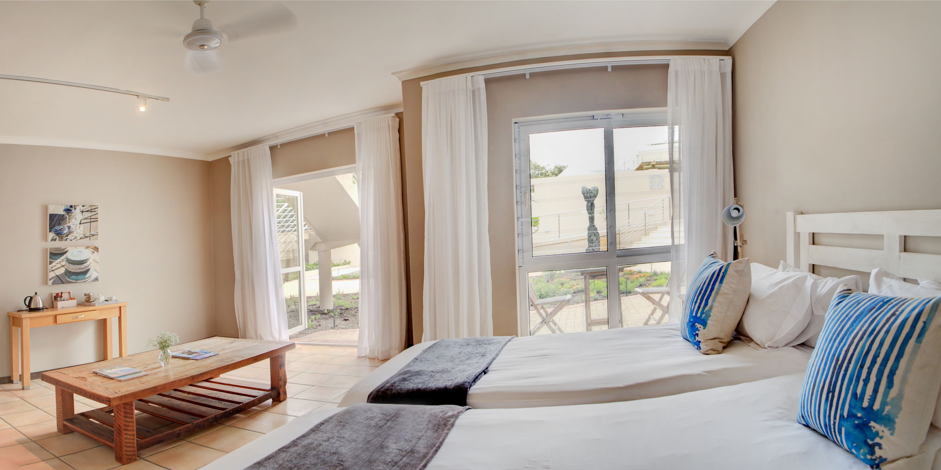 Standard Room, Courtyard View | Minibar, in-room safe, individually decorated, individually furnished