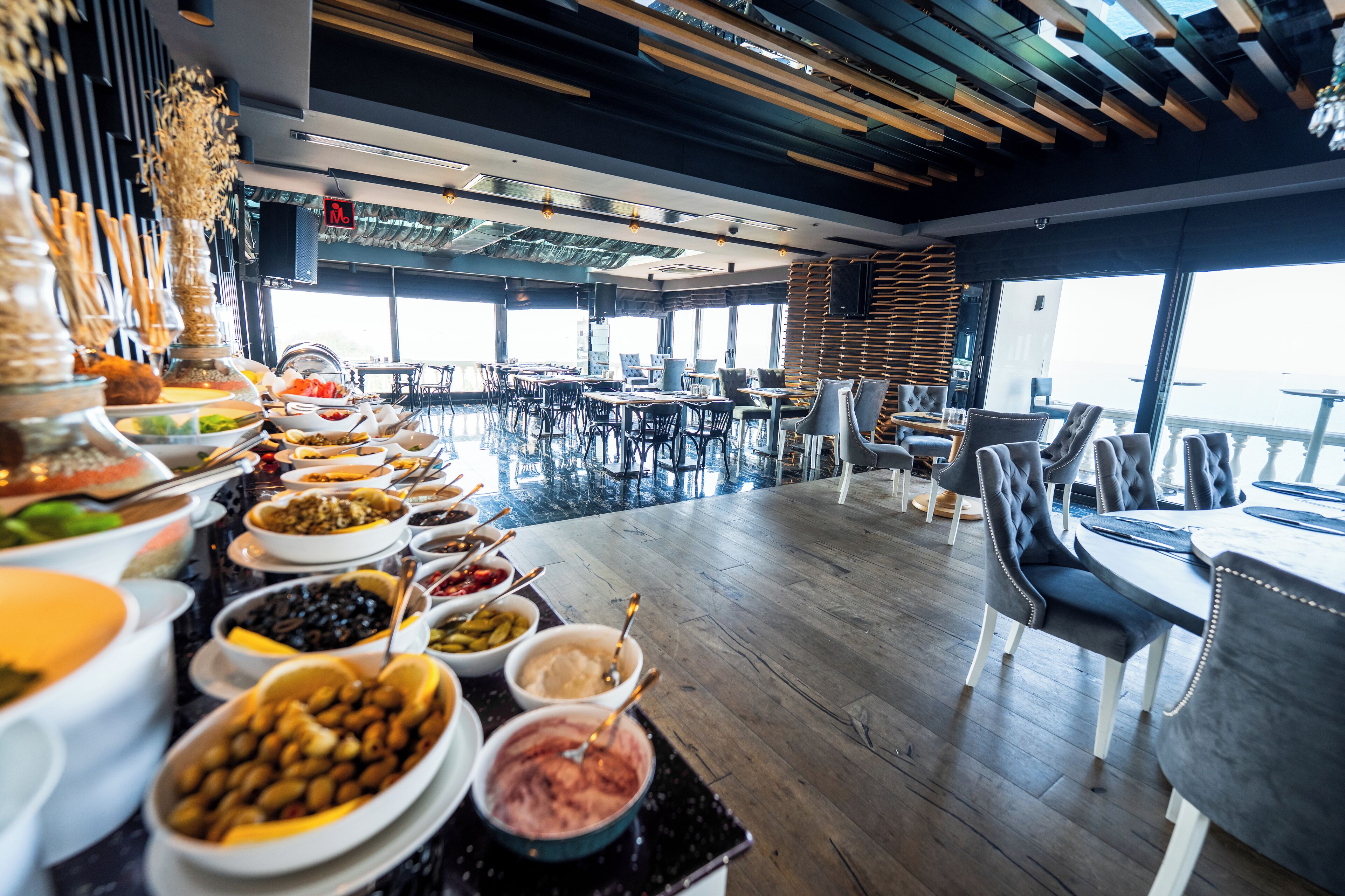 Breakfast, lunch, dinner served; local and international cuisine 