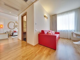 Premium bedding, down comforters, minibar, in-room safe