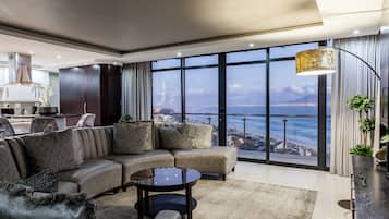 Three Bedroom Penthouse Suite (12) | Living area | Flat-screen TV