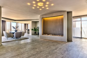 Presidential Penthouse | Living area | Flat-screen TV