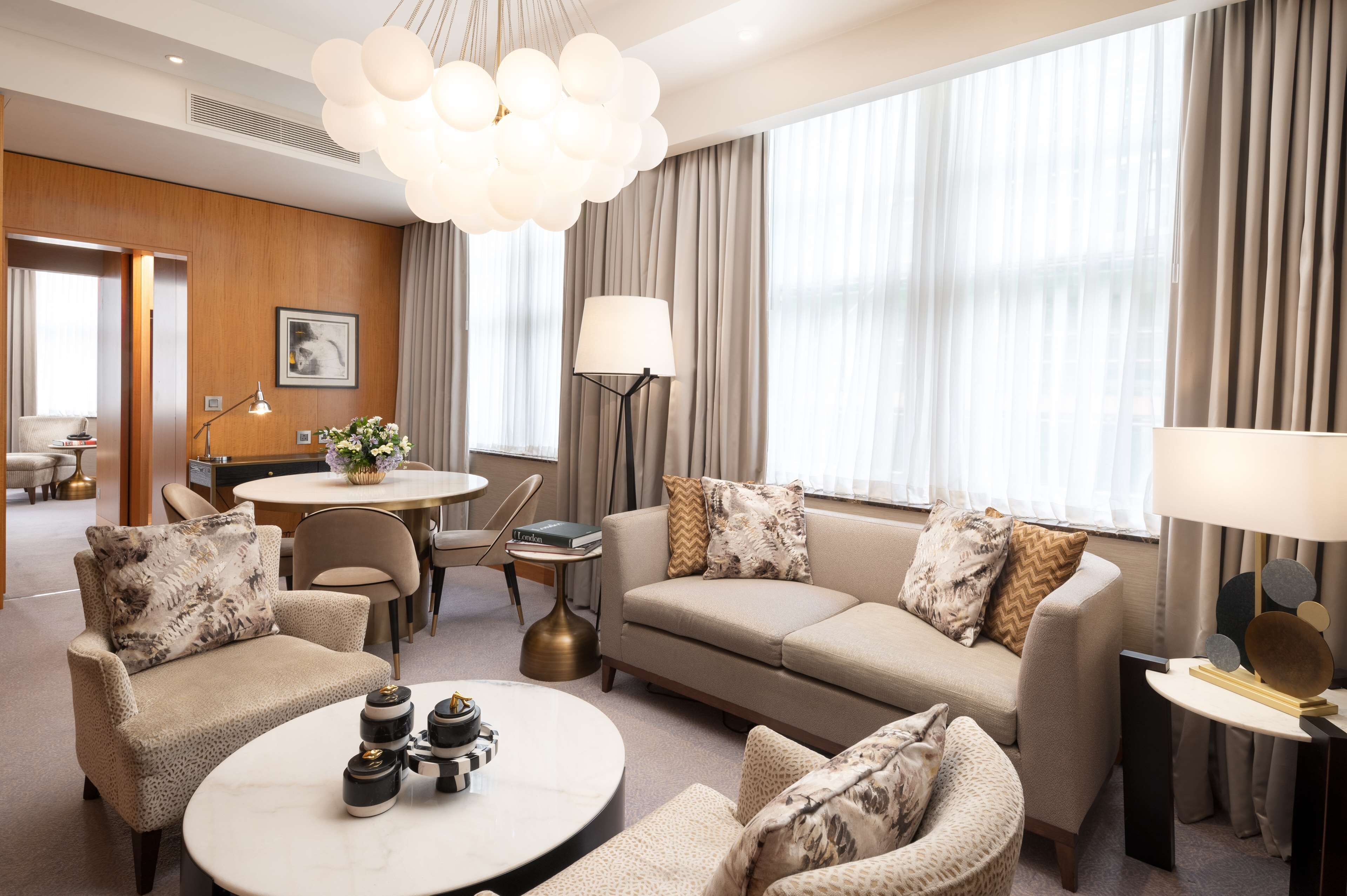One Bedroom Suite | Living area | 42-inch flat-screen TV with digital channels, TV