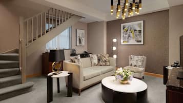 One Bedroom Duplex Suite | Living area | 42-inch flat-screen TV with digital channels, TV