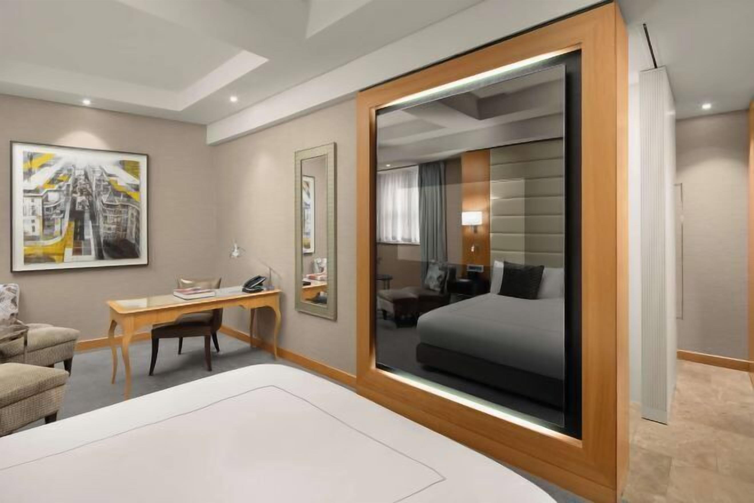 Premium bedding, Select Comfort beds, free minibar items, in-room safe