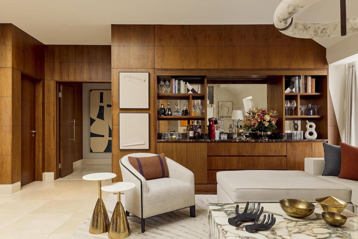 Conrad Suite | Living area | 42-inch flat-screen TV with digital channels, TV