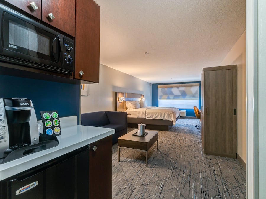 Suite, 1 King Bed | In-room safe, desk, iron/ironing board, free cribs/infant beds