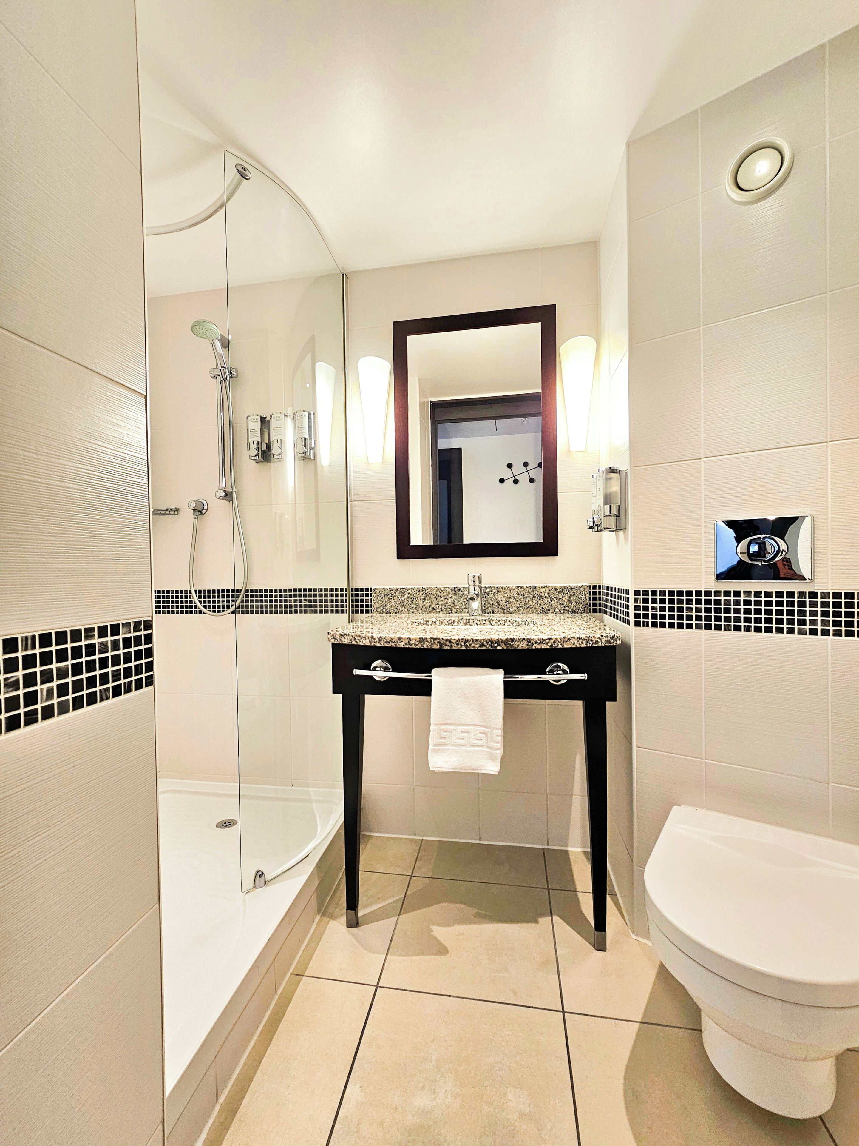 Shower, free toiletries, hair dryer, towels