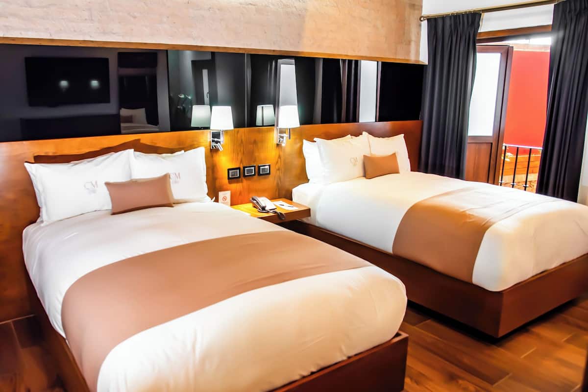 junior suite, 2 double beds | 1 bedroom, premium bedding, in-room safe, iron/ironing board