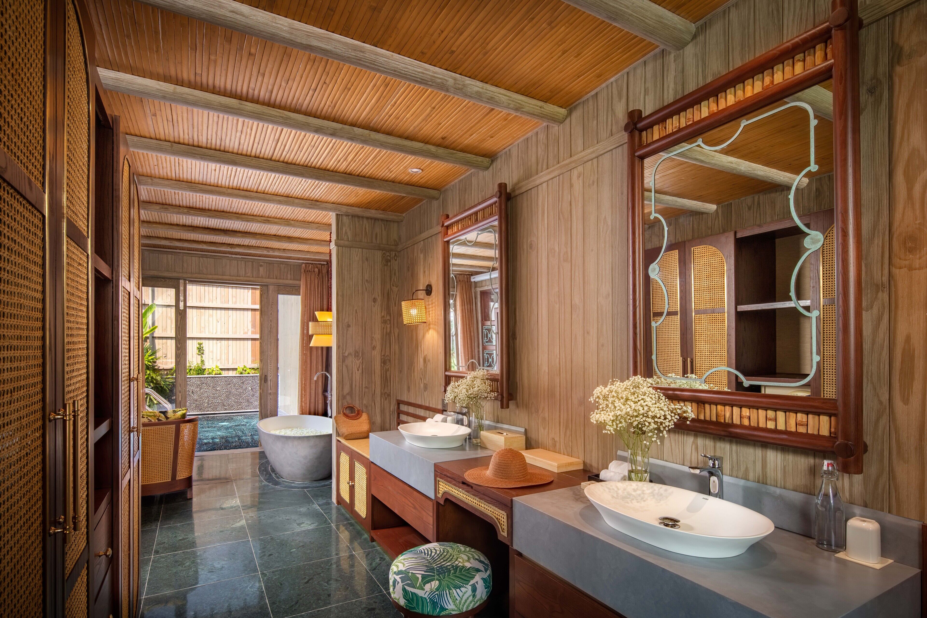 garden pool villa | bathroom | rainfall showerhead, designer toiletries, hair dryer, bathrobes