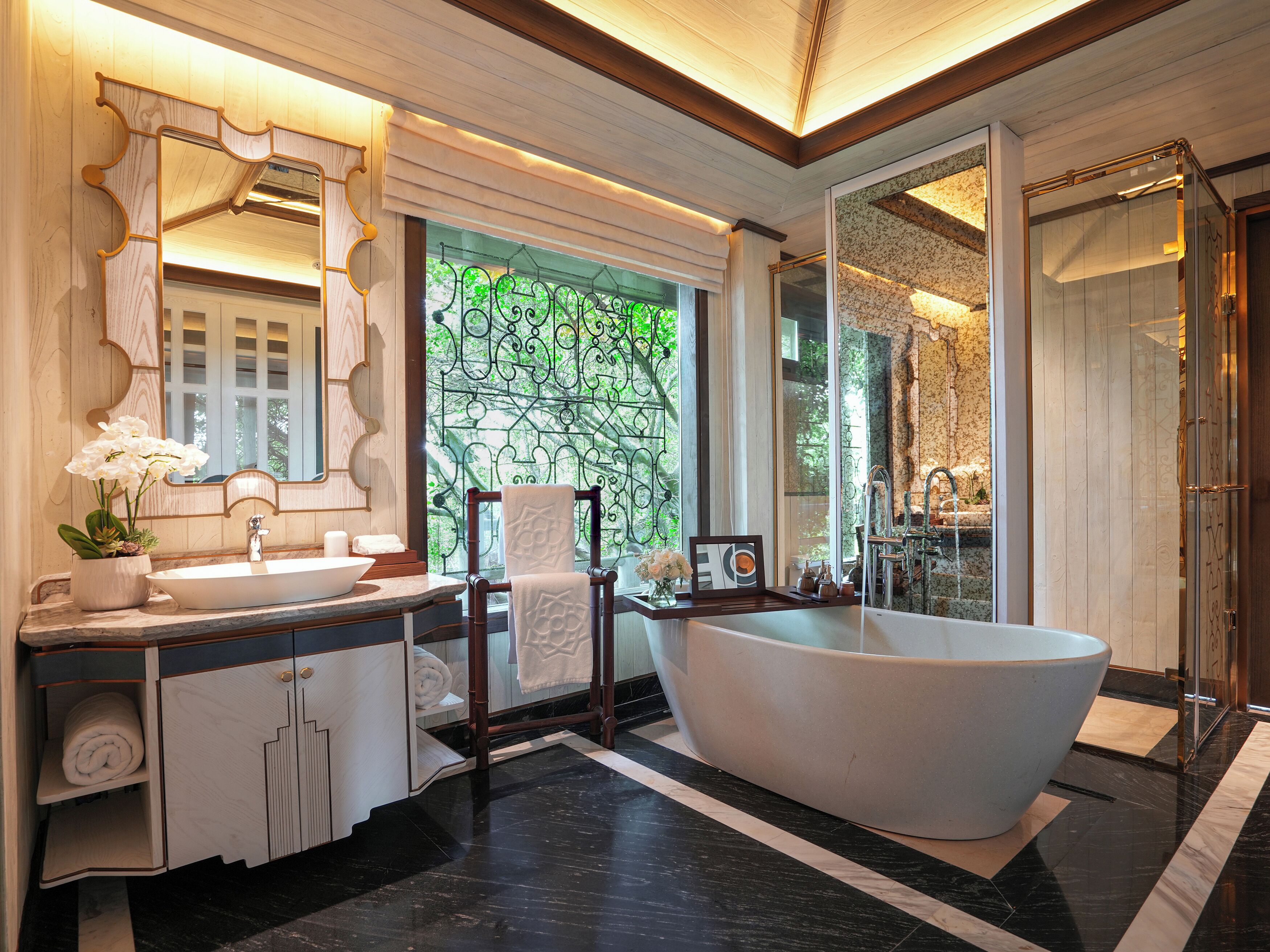 Presidential Suite | Bathroom | Rainfall showerhead, designer toiletries, hair dryer, bathrobes