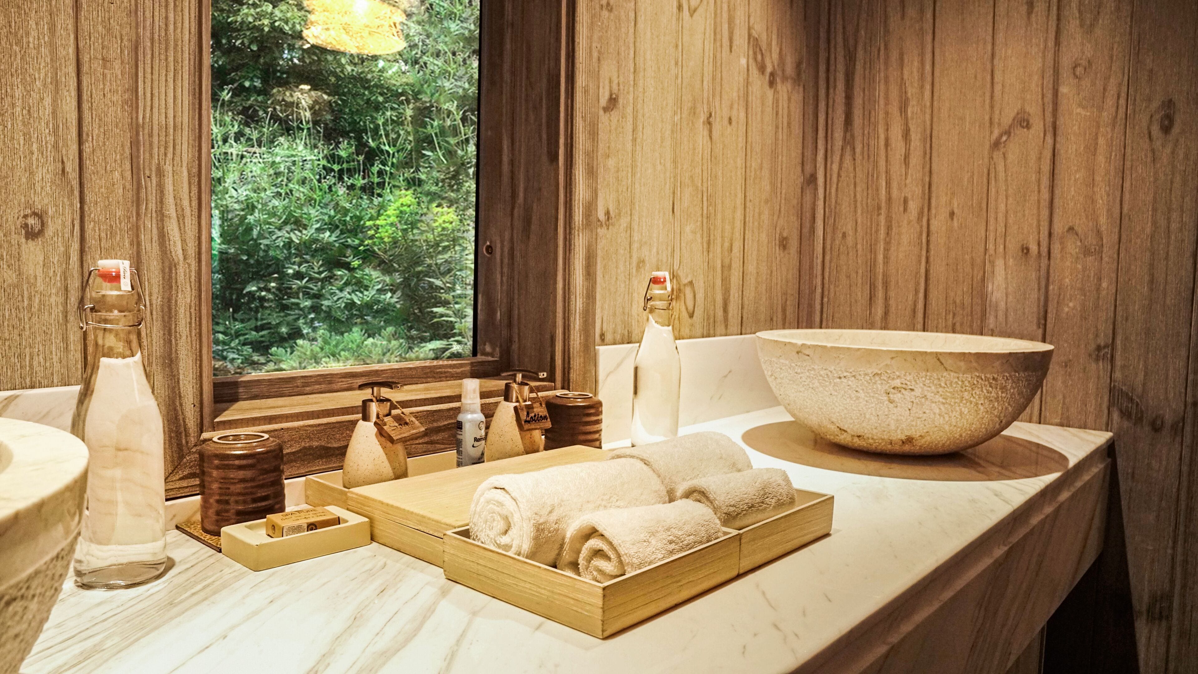 rainfall showerhead, designer toiletries, hair dryer, bathrobes