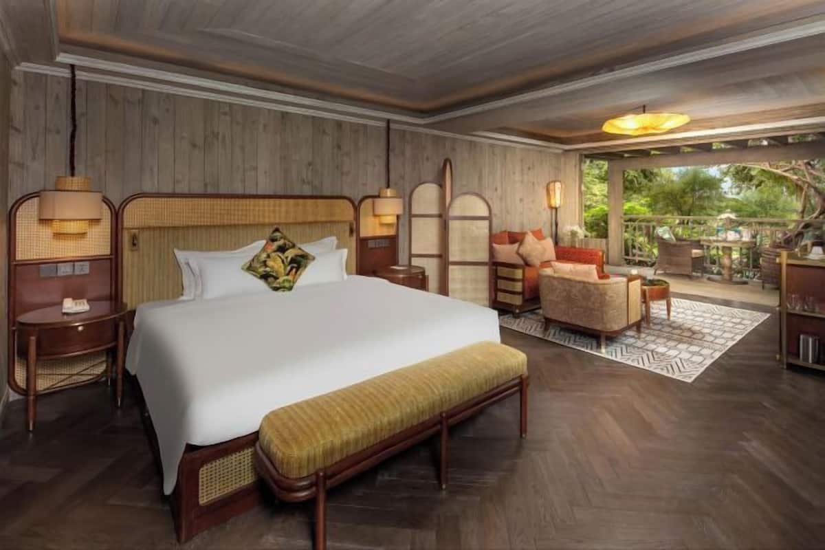 2 habitaciones, ropa de cama de alta calidad, cubrecamas y minibar