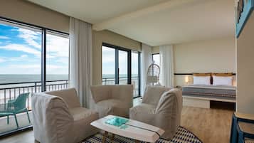Suite, 1 King Bed, Balcony, Oceanfront | In-room safe, individually decorated, desk, laptop workspace