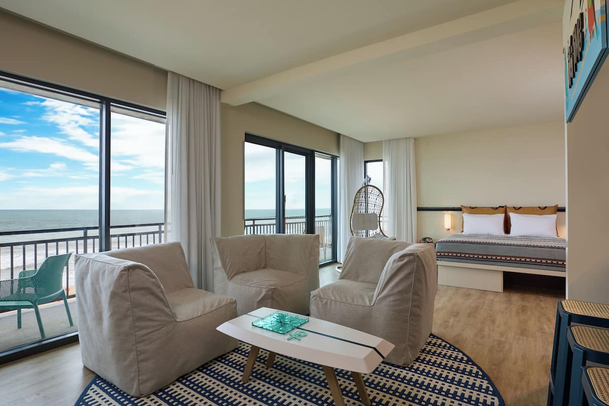 Suite, 1 King Bed, Balcony, Oceanfront | Hypo-allergenic bedding, in-room safe, individually decorated, desk