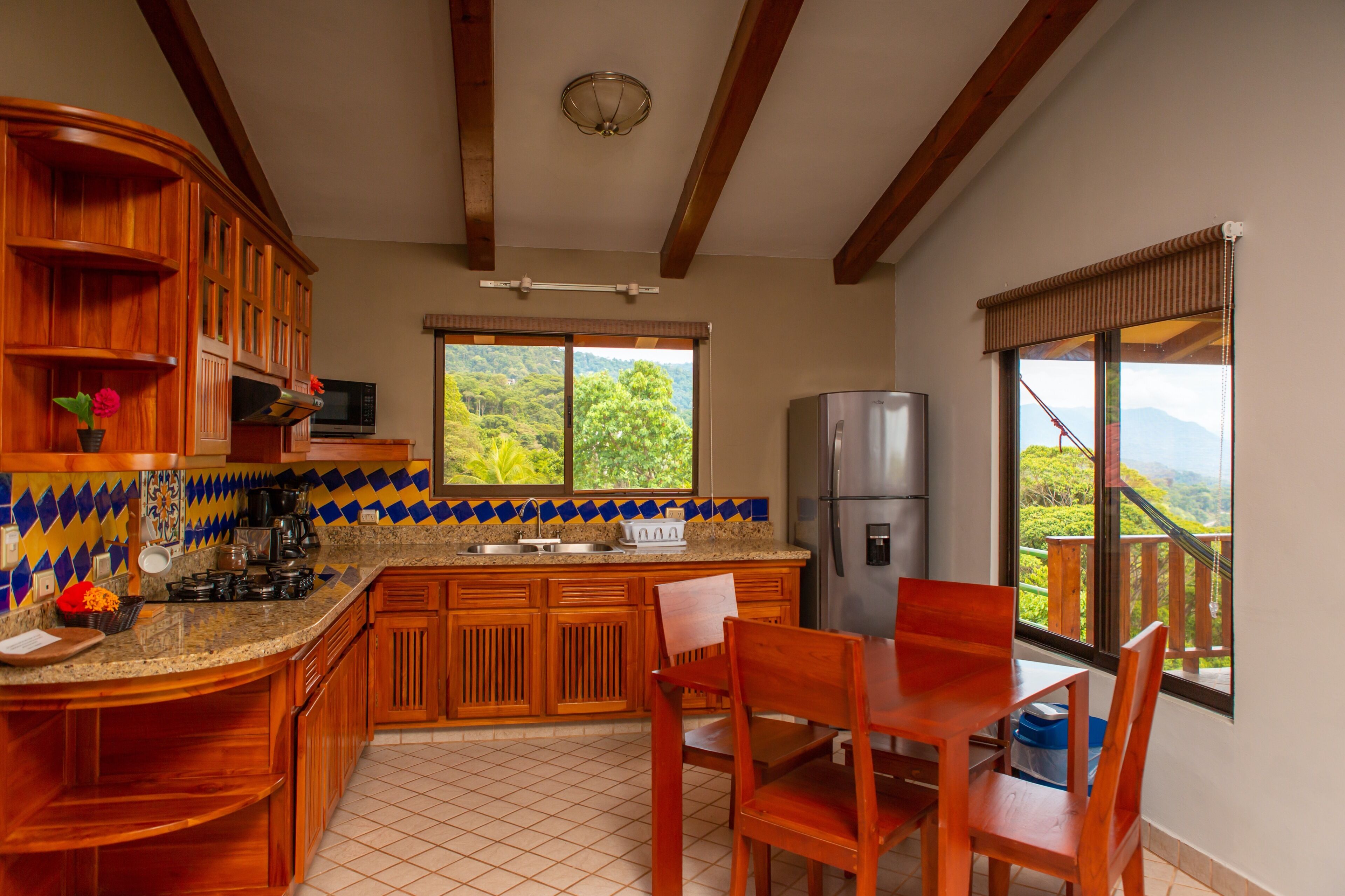 villa, 1 bedroom | private kitchen | fridge, microwave, stovetop, coffee/tea maker