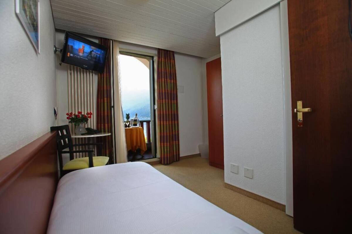 single room, lake view loggia | 1 bedroom, in-room safe, blackout curtains, free wifi