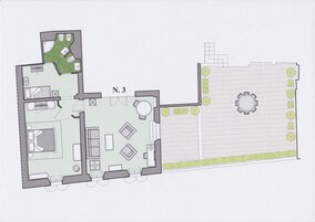 A floor plan of a hotel with multiple rooms, a dining area, and a courtyard with a circular seating arrangement.