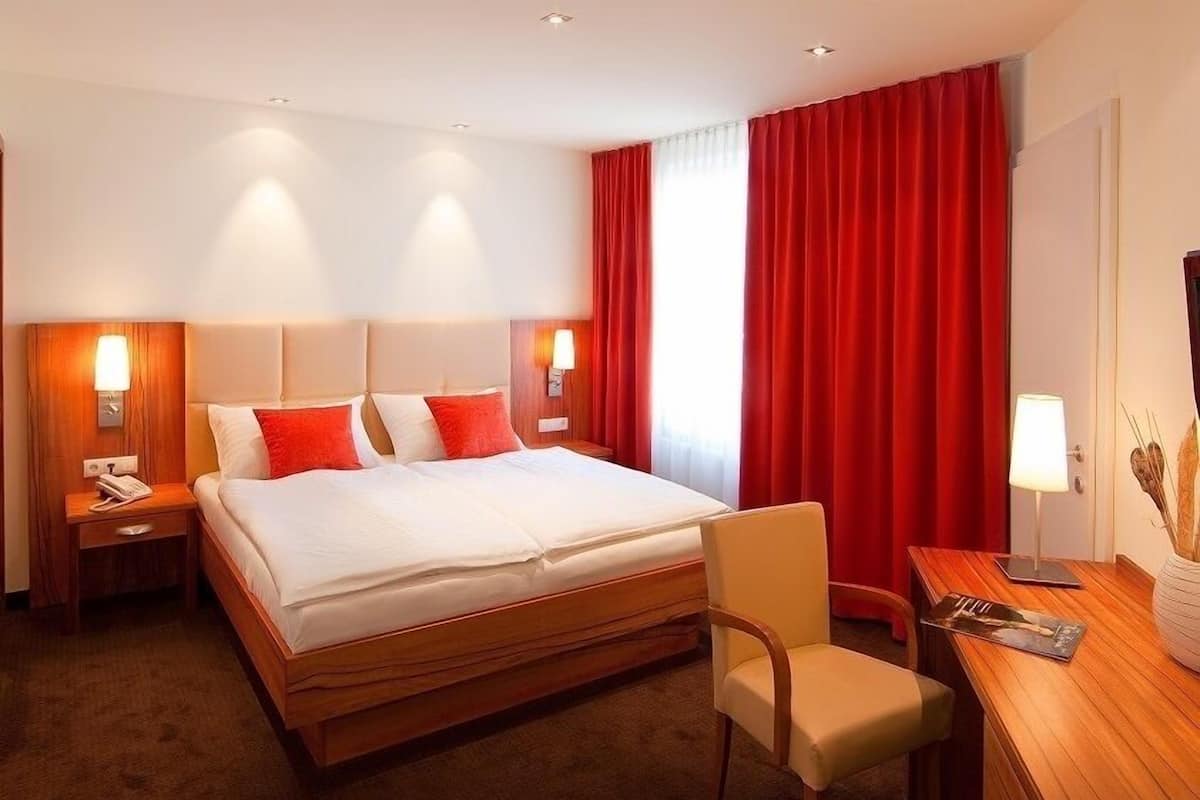Luxe beddengoed, een kluis op de kamer, individueel gemeubileerd