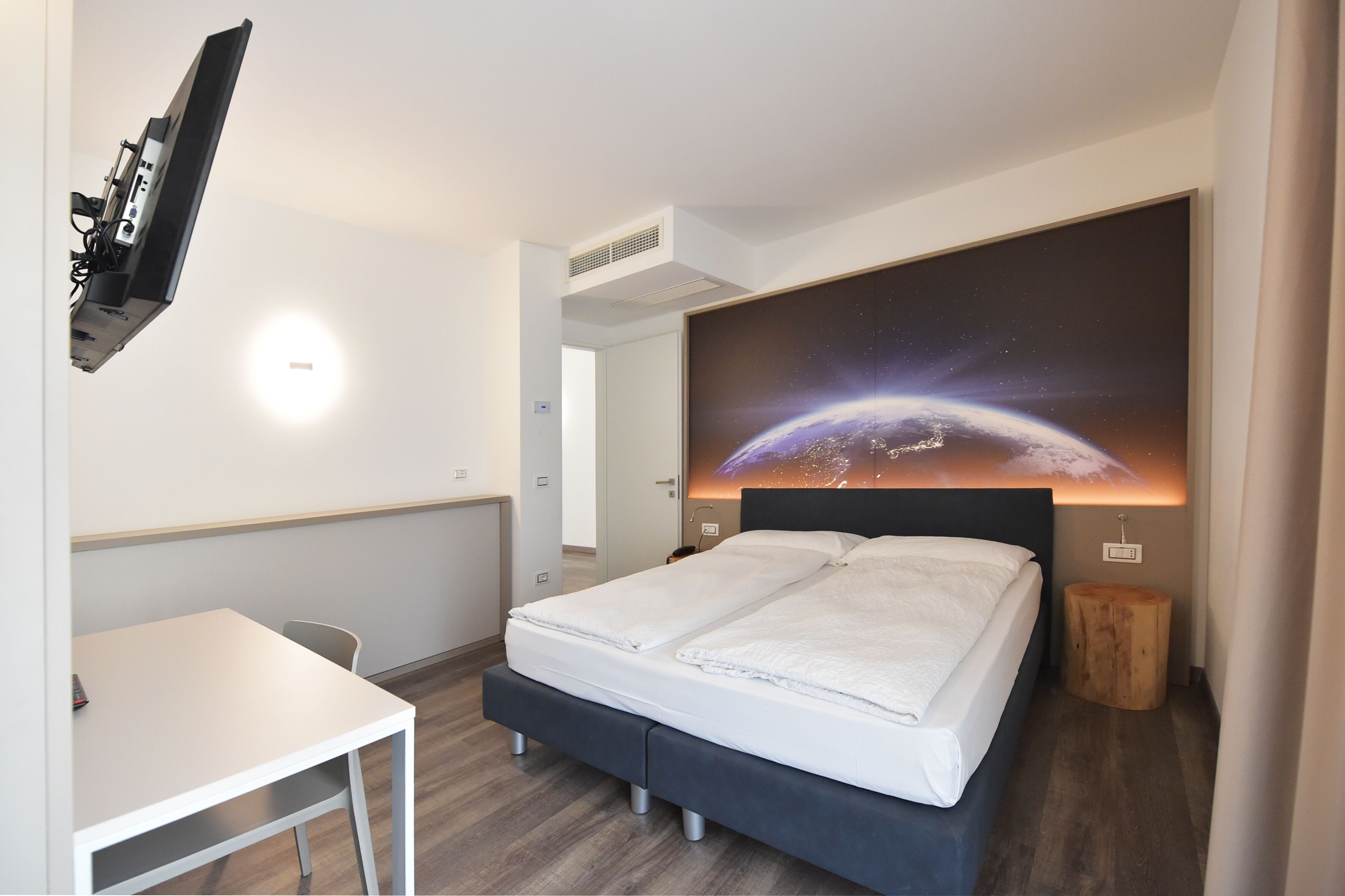 executive apartment | frette italian sheets, premium bedding, down duvets, in-room safe