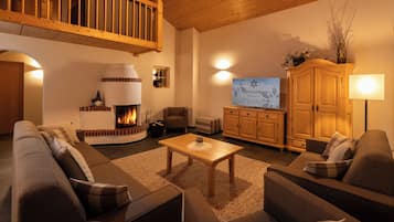Comfort Apartment, 4 Bedrooms, Sauna (Adlerhorst) | Living area | 120-cm flat-screen TV with cable channels, Smart TV, ping pong