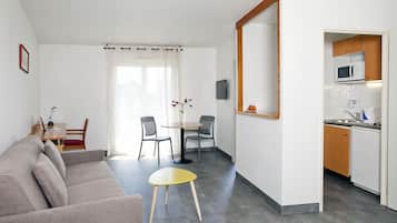 Premium appartement | Woonruimte | Een televisie