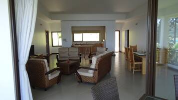 Deluxe Villa, 2 Double Beds, Kitchen, Ocean View | Living area | TV, DVD player
