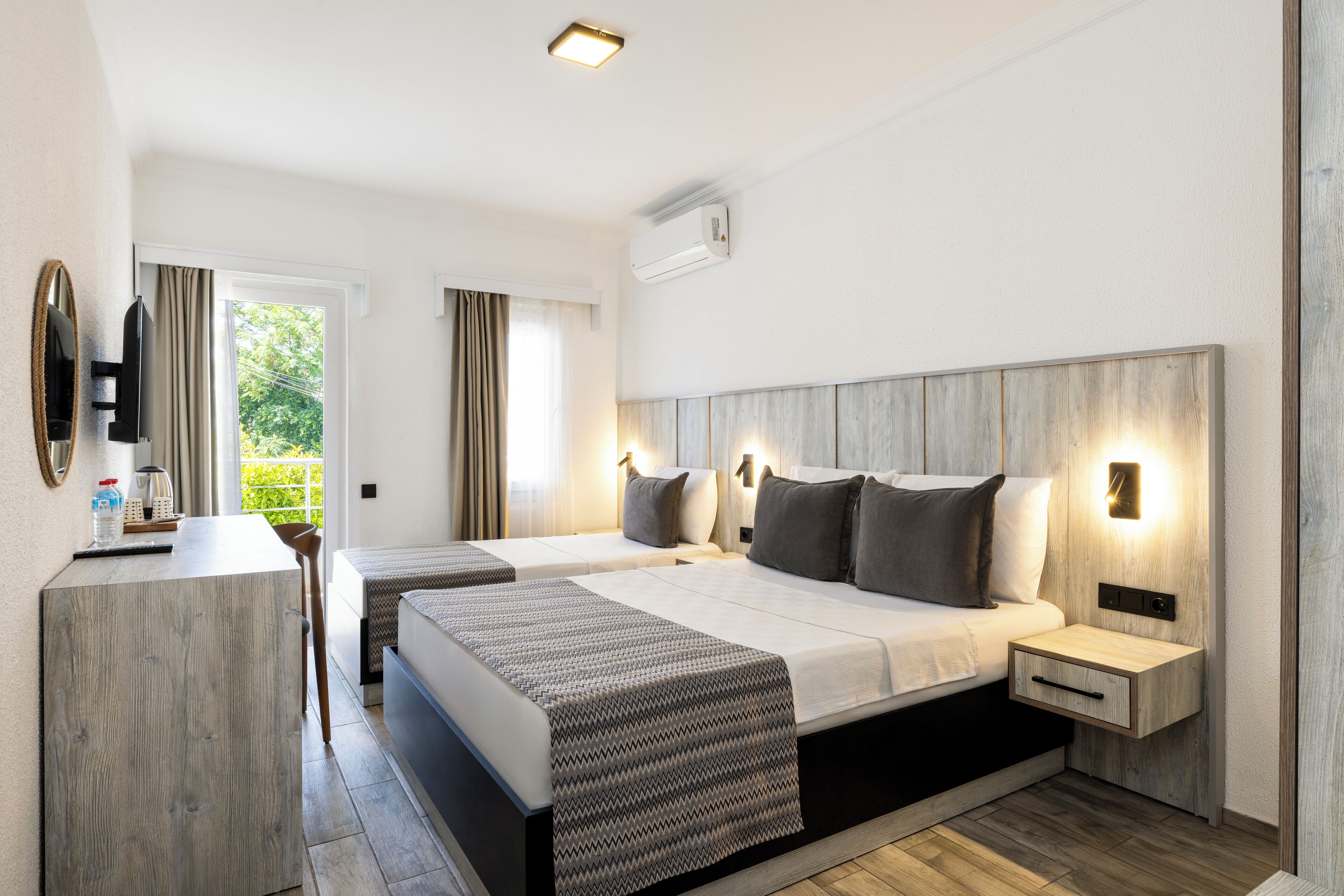 Superior Triple Room, Balcony | Premium bedding, minibar, desk, blackout drapes