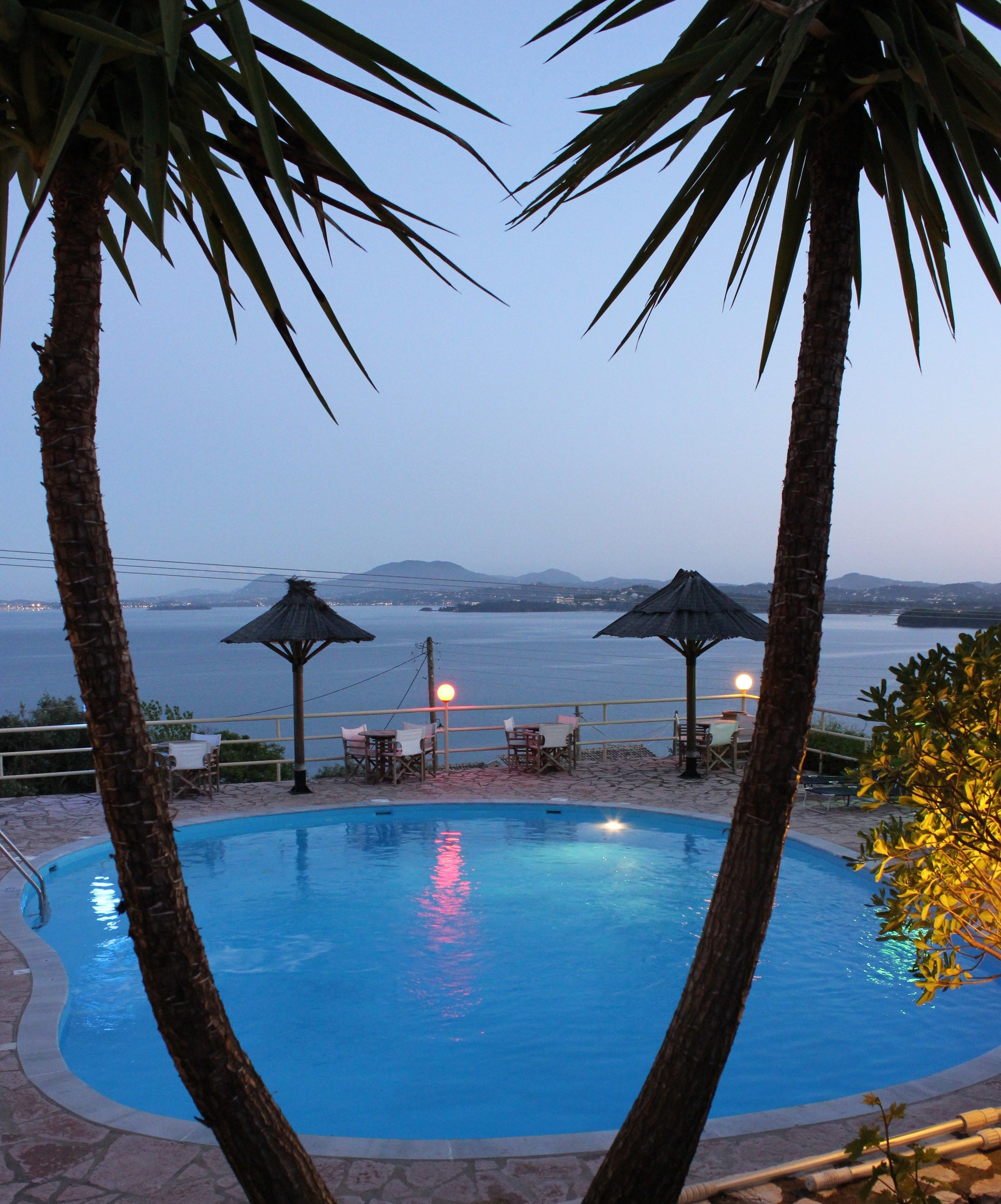 outdoor pool, pool umbrellas, pool loungers