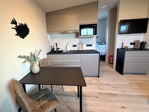 Studio64 | Living area | Flat-screen TV, heated floors