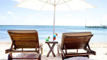 On the beach, beach umbrellas, beach massages
