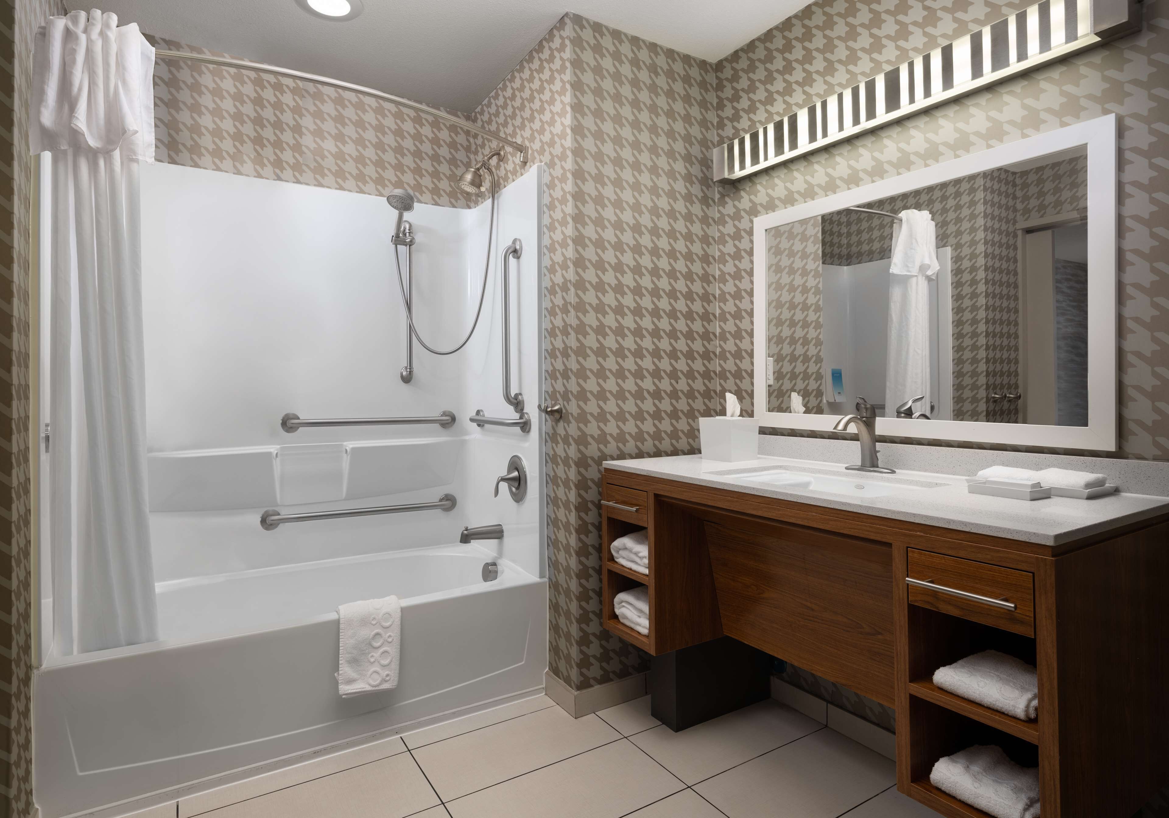 suite, 1 king bed, accessible, bathtub | bathroom | free toiletries, hair dryer, towels