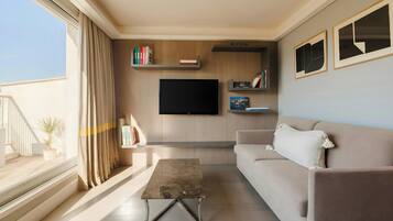 42-inch flat-screen TV with cable channels, TV