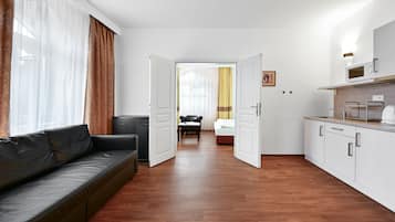 Panoramic-Apartment, 1 Schlafzimmer, Stadtblick | Wohnbereich