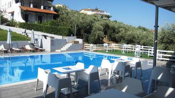 Seasonal outdoor pool, sun loungers