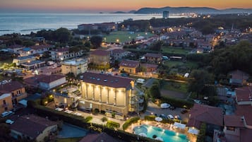 Seasonal outdoor pool, pool umbrellas, pool loungers