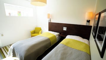 Hypo-allergenic bedding, desk, blackout curtains, soundproofing