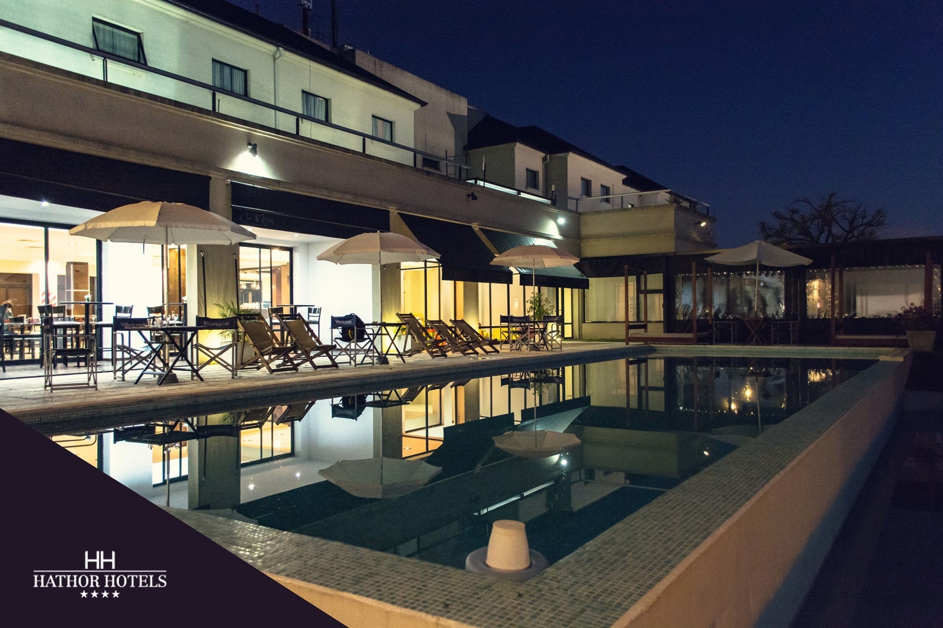 indoor pool, outdoor pool, pool umbrellas, pool loungers