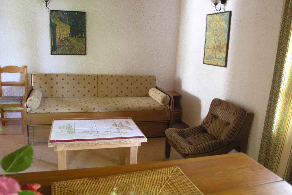 Traditional Cottage, 1 Bedroom, Beach View | Living area | Flat-screen TV