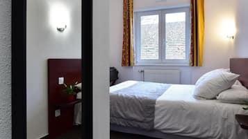 Memory foam beds, desk, blackout drapes, soundproofing