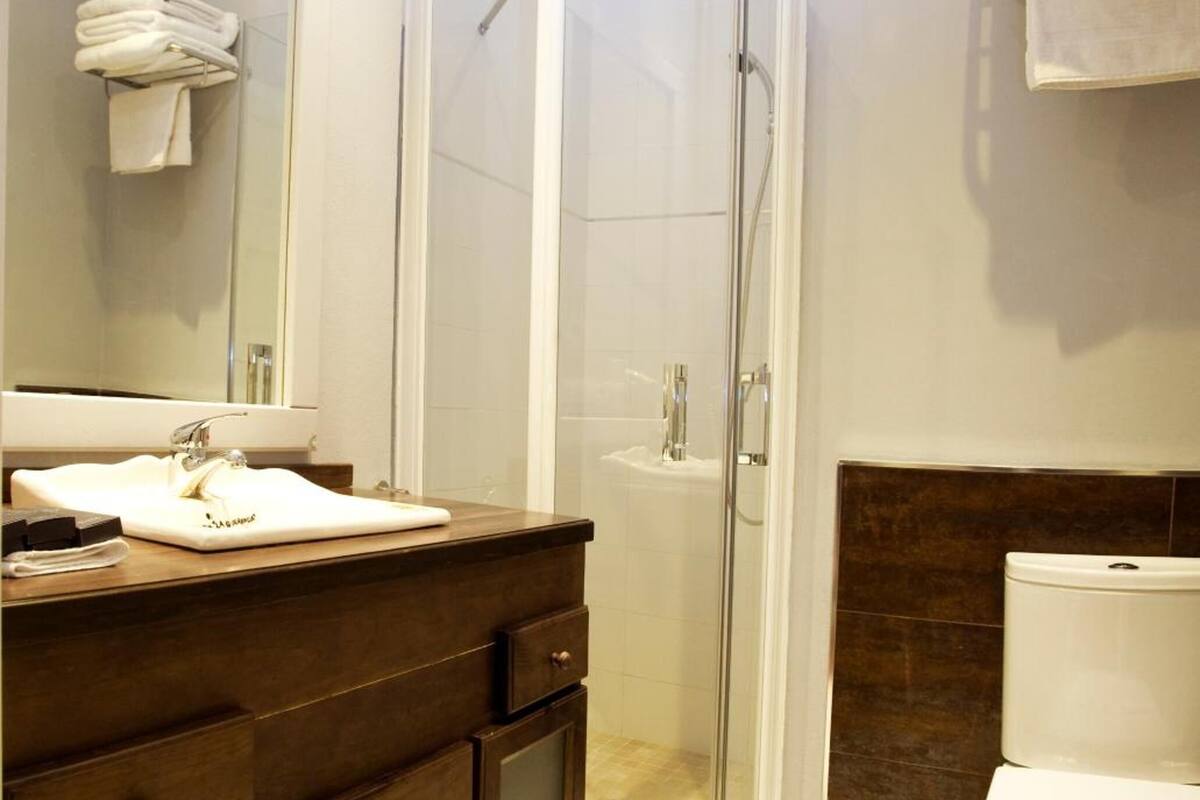 shower, rainfall showerhead, designer toiletries, hair dryer